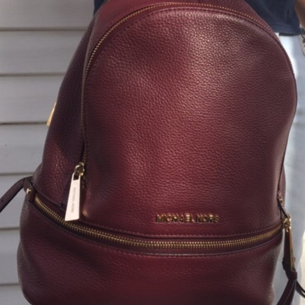 Burgundy Michael Kors backpack